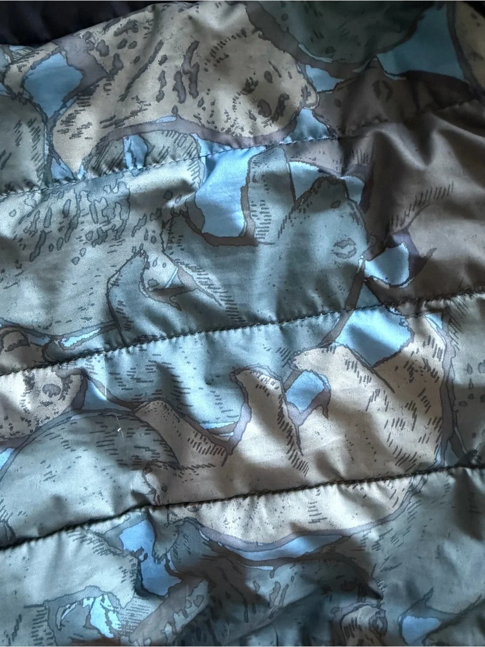 The North Face Navy and Light Blue Camouflage Puffer Jacket